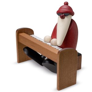 Weihnachtsmann am braunen Piano